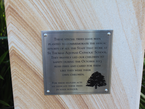 The commemorative plaque set on Blue Mountains sandstone