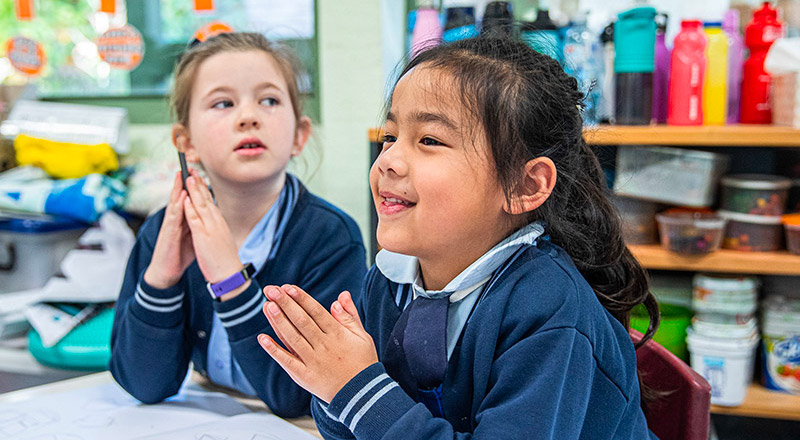 St Thomas Aquinas Catholic Primary Springwood students praying