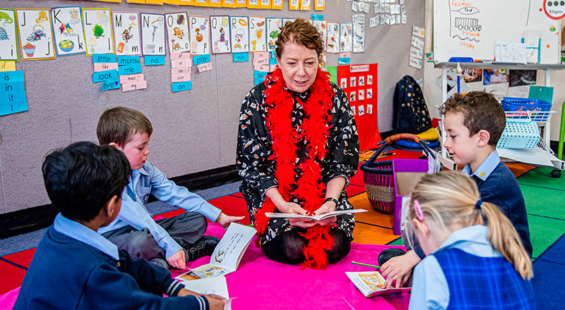 Teacher educating St Thomas Aquinas Catholic Primary Springwood students