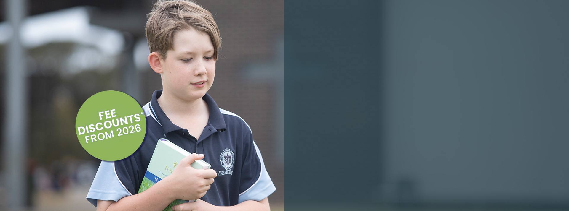 St Thomas Aquinas Catholic Primary School child walking with bible