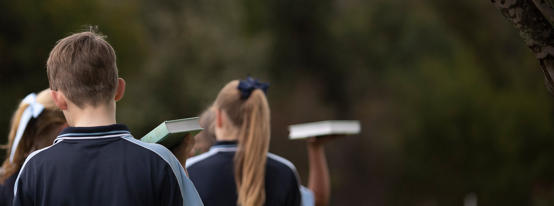 St Thomas Aquinas Catholic Primary School Springwood students with bibles