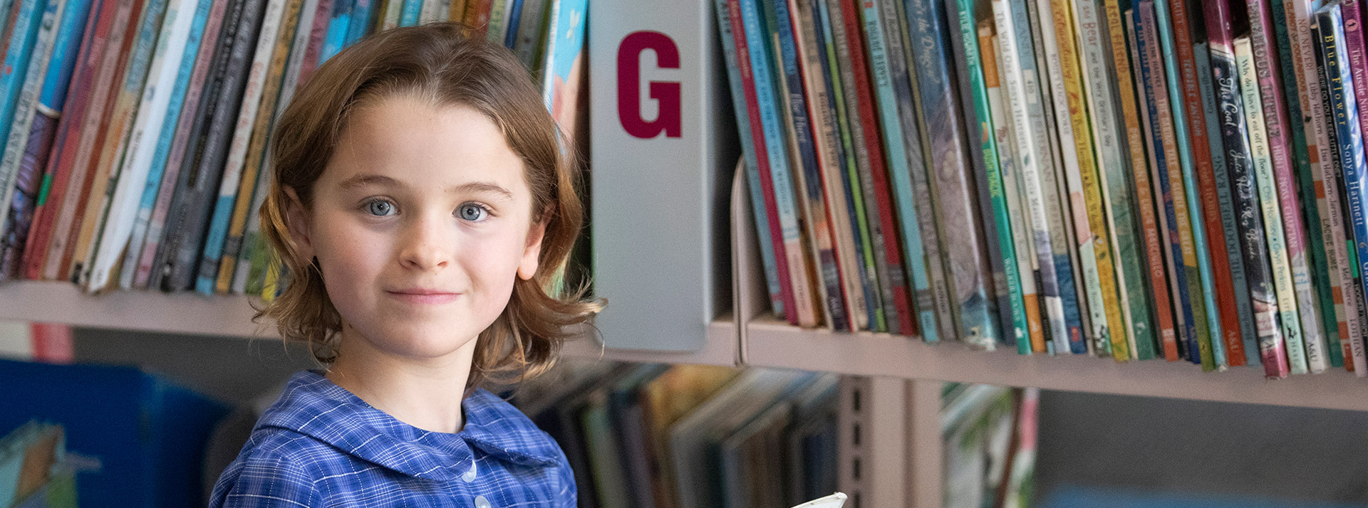 Students reading at St Thomas Aquinas Catholic Primary Springwood
