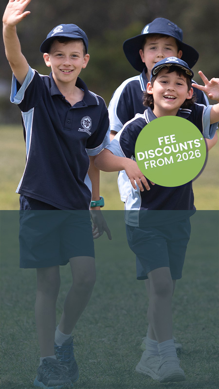St Thomas Aquinas Catholic Primary School students playing on school field