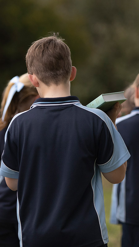 St Thomas Aquinas Catholic Primary School Springwood students with bibles