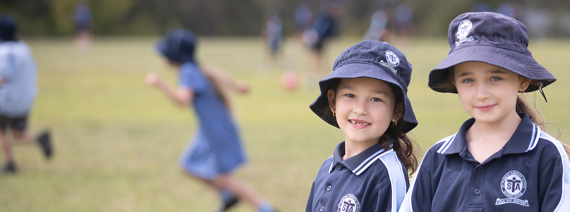 St Thomas Aquinas Catholic Primary Springwood students on oval