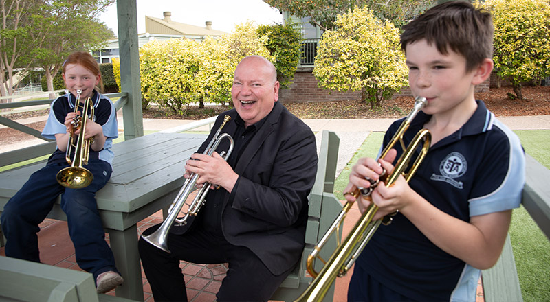 St Thomas Aquinas Catholic Primary School students learning musical instruments