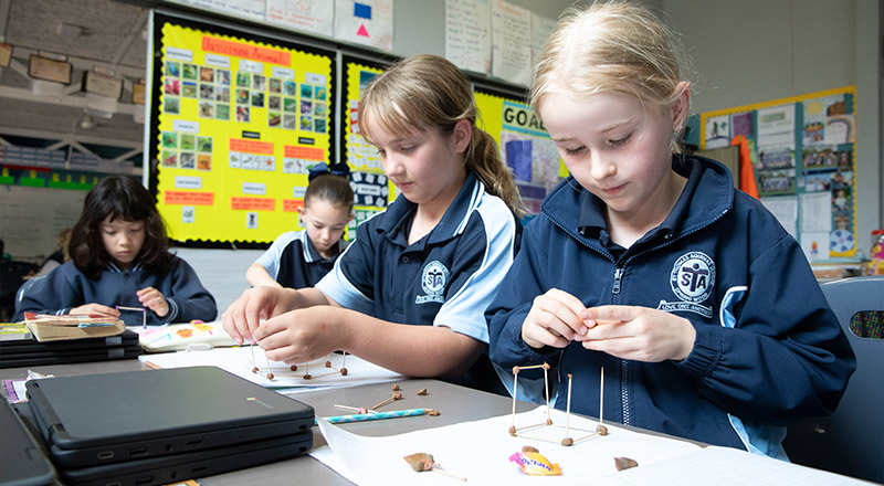 St Thomas Aquinas Catholic Primary School students learning robotics