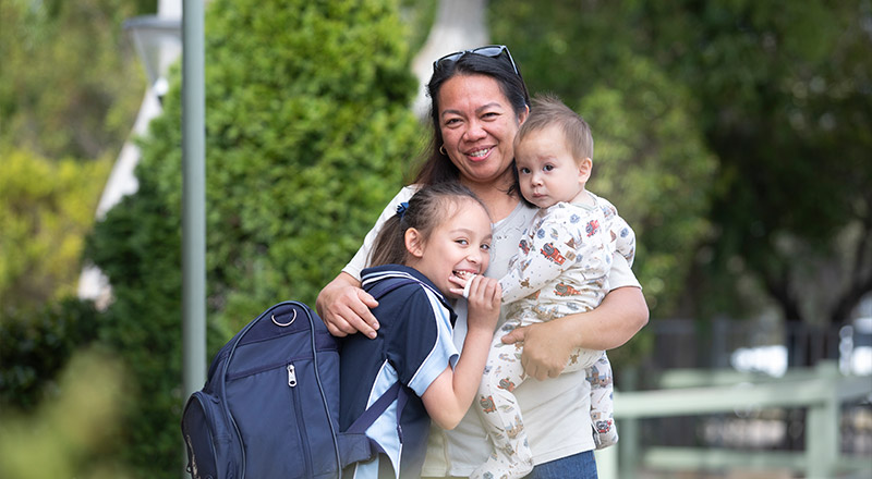 St Thomas Aquinas Catholic Primary Springwood student with their parents