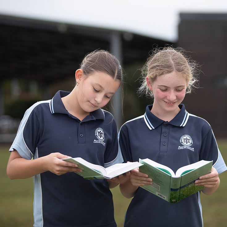 St Thomas Aquinas Catholic Primary Springwood students reading bible