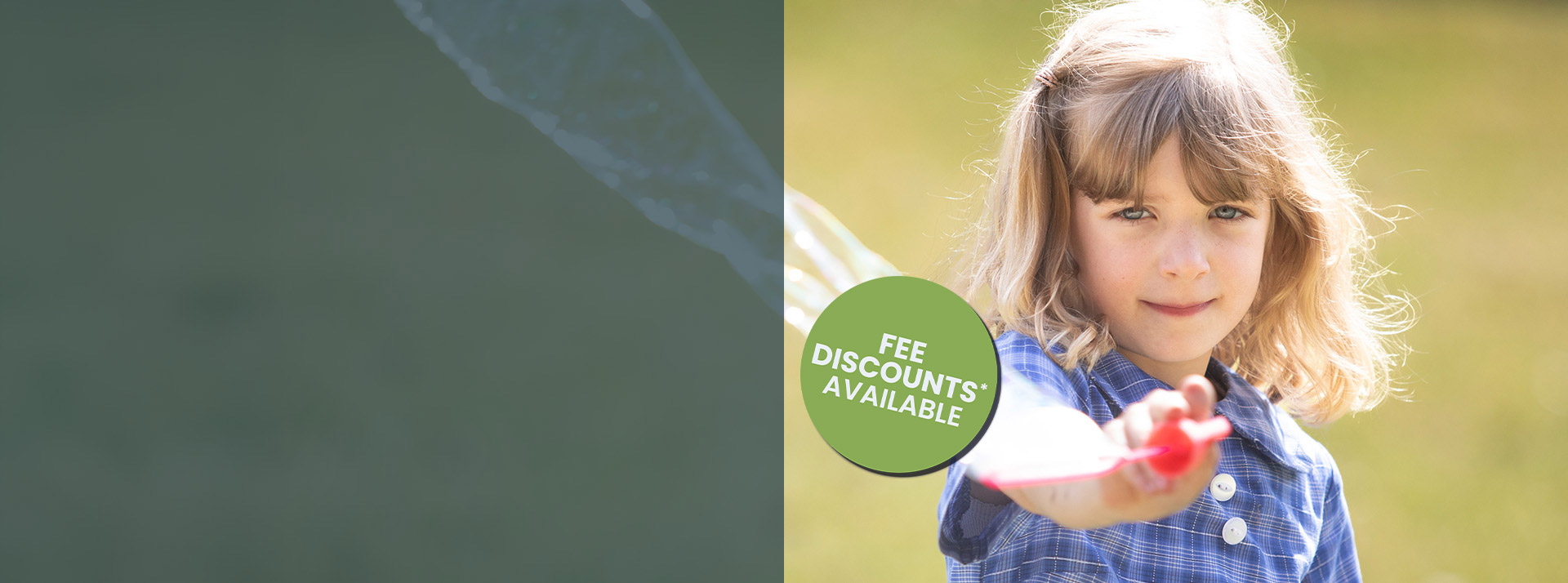 St Thomas Aquinas, Springwood student blowing bubbles