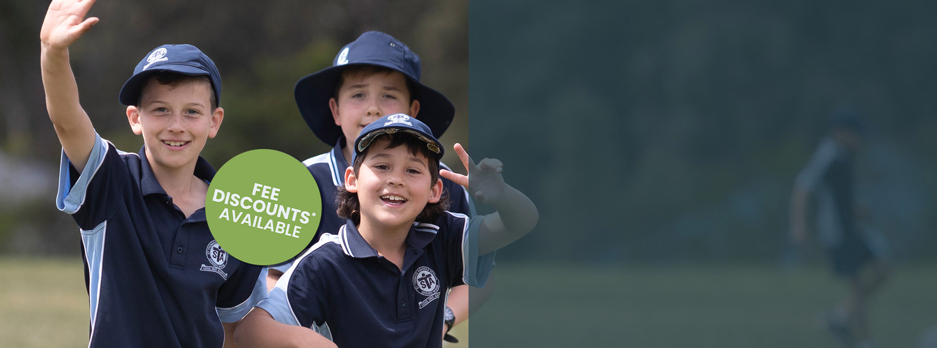 Happy St Thomas Aquinas, Springwood students on sports field