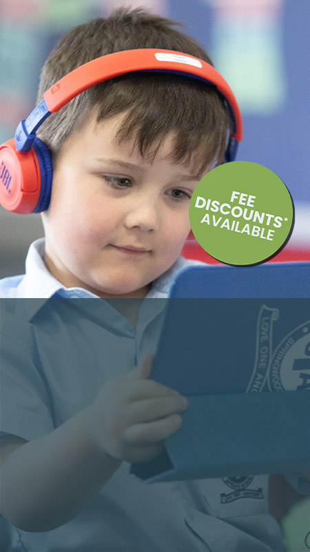 St Thomas Aquinas, Springwood student using iPad and headphones
